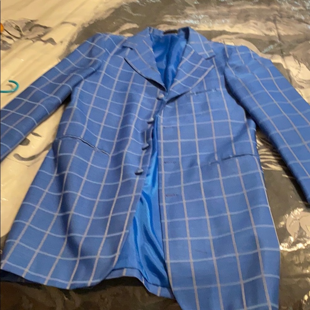 Three piece suit. Blue striped. Made by Falcone .